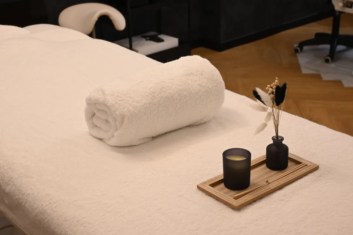 Quiet spa room prepared for a professional massage visit